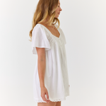 Summer bridal morning outfit featuring white cotton mini dress