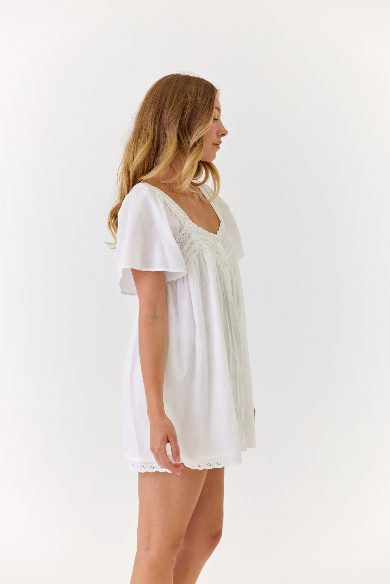 Summer bridal morning outfit featuring white cotton mini dress